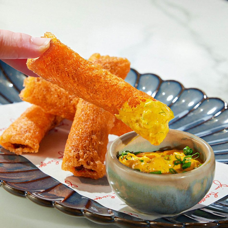 Crispy Thai appetizer with dipping sauce at Jim Thompson restaurant